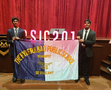 1. Malay Kasha & Abhinav. M with our school flag 1. Malay Kasha & Abhinav. M with our school flag