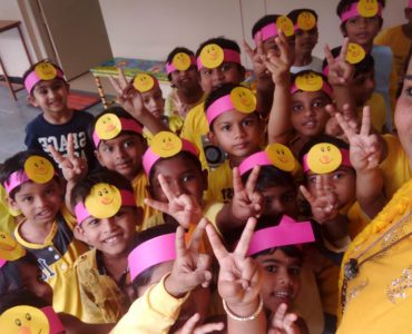 6.Little ones smiling their way to selfie with their teacher.