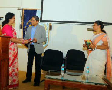 12.The Vice Principal giving a memento